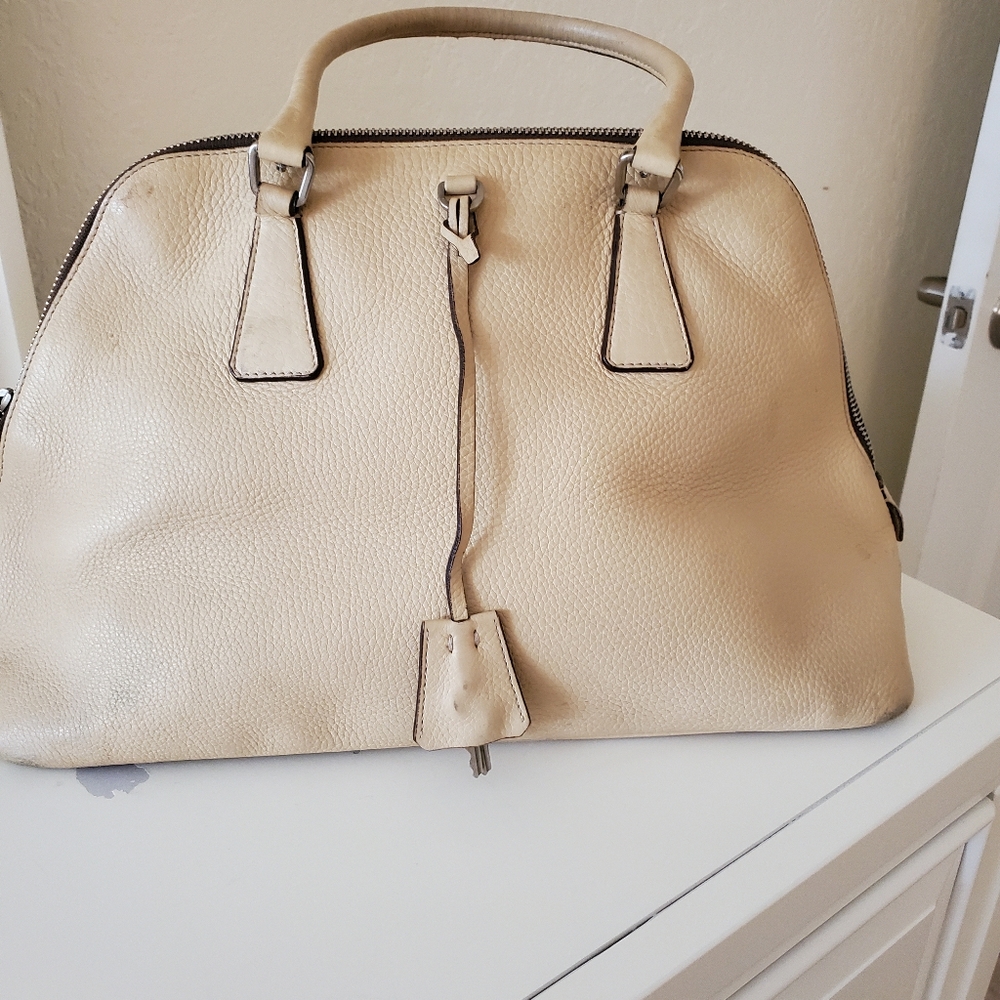 Elegant Prada Cream Leather Handbag